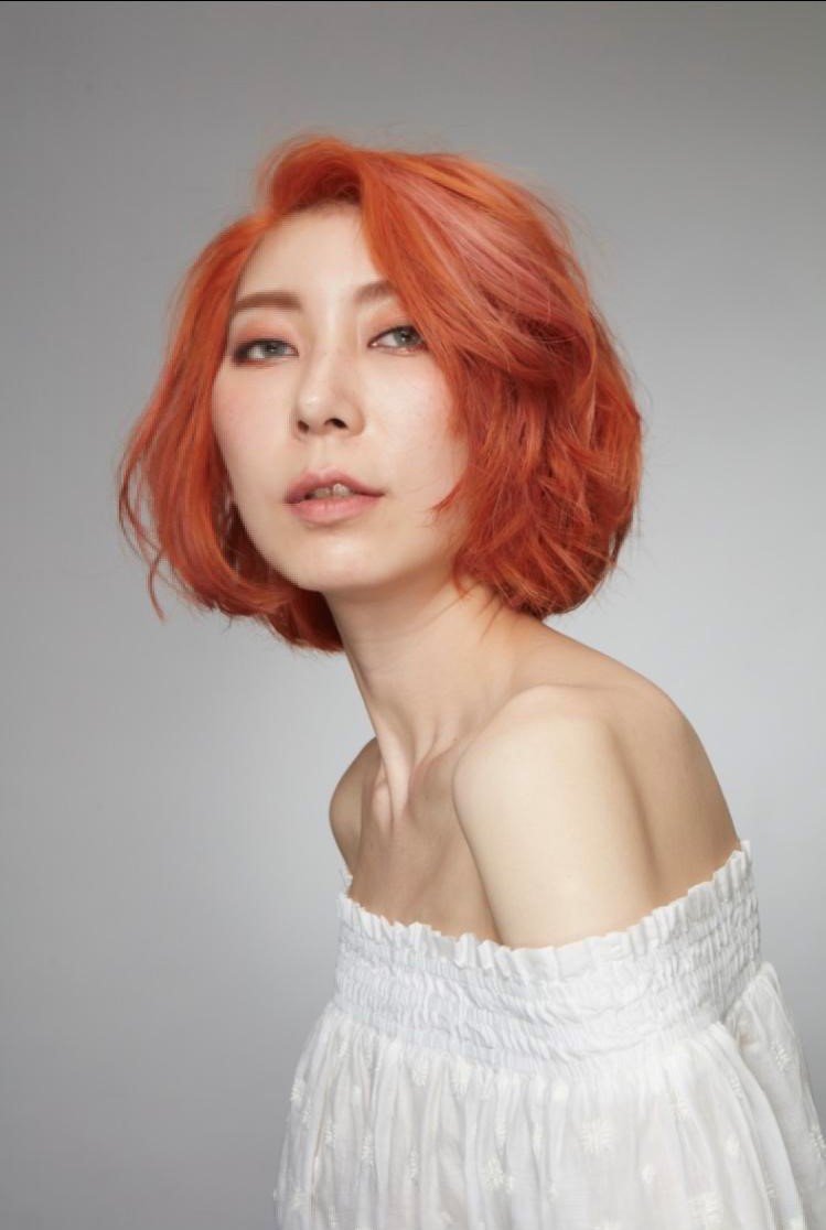 台北市Minnie Kuo FLUX_collection HAIR BOUTIQUE設計師Minnie Kuo的橘色系髮型