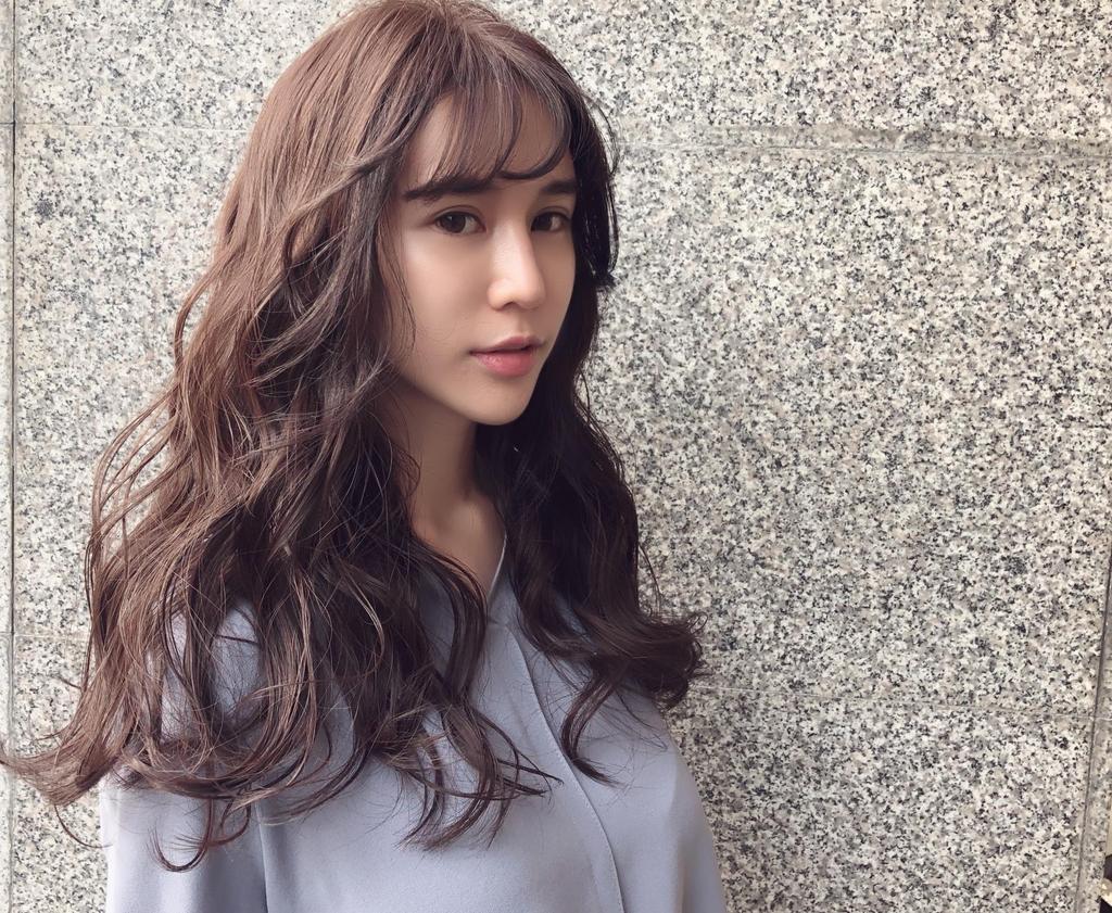 高雄市尤拿髮藝自由旗艦店設計師Wilson Chin的玫瑰咖啡染髮作品