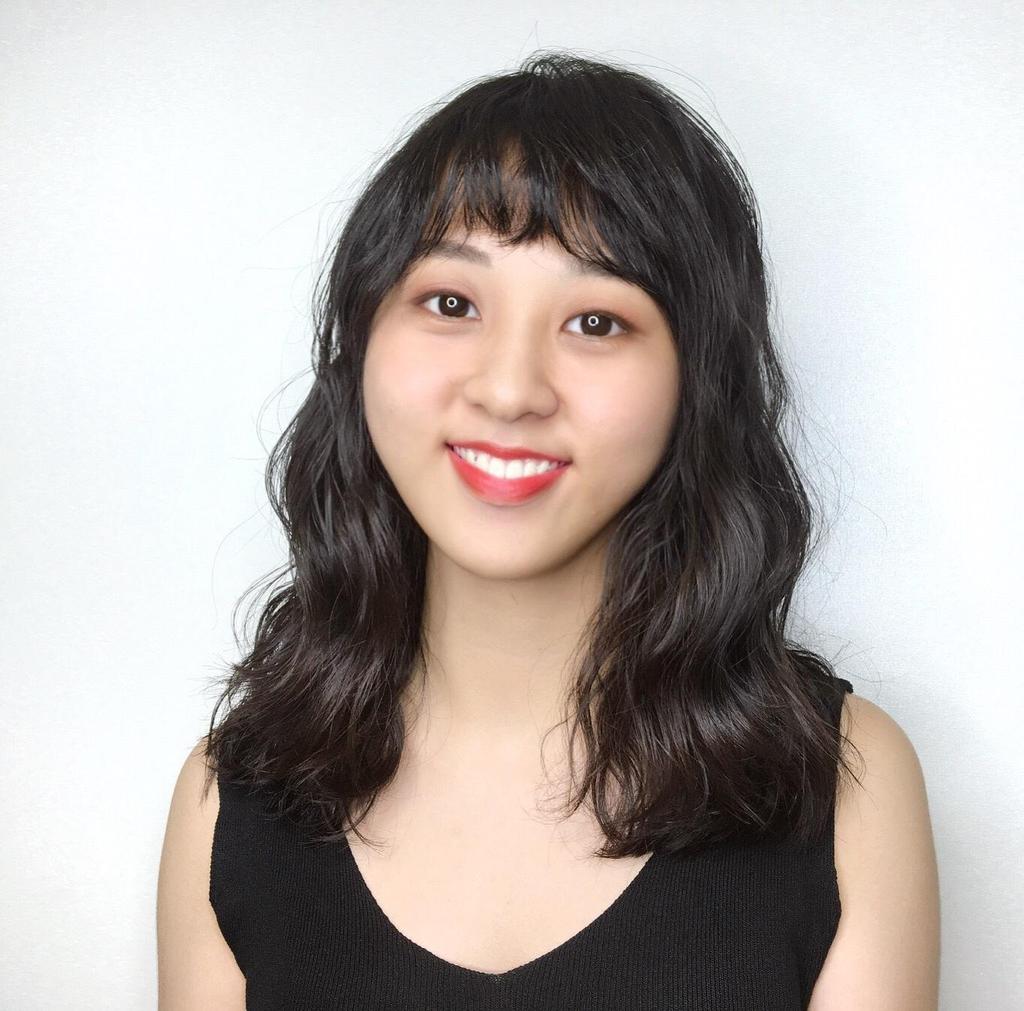 台北市in%hair cafe設計師Carina的長卷髮作品