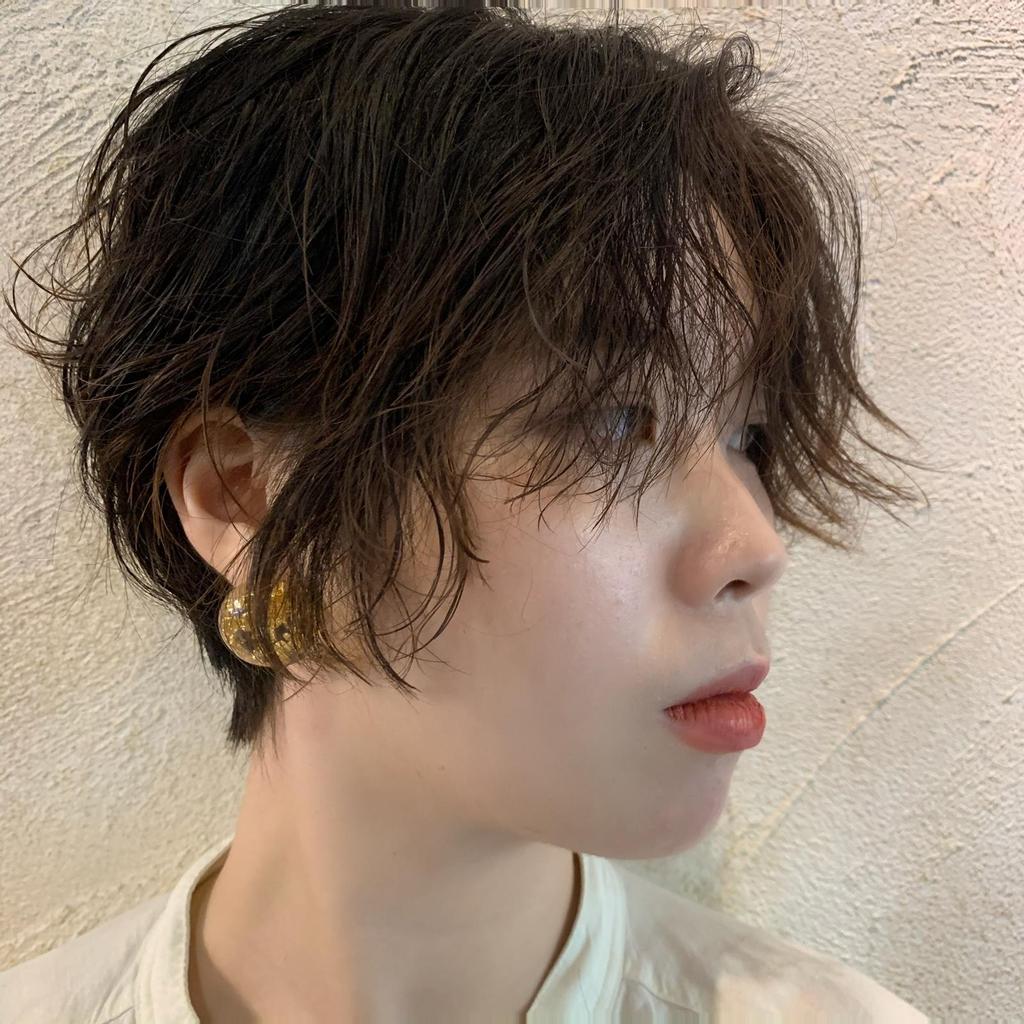 男孩風女生短髮、女生卷髮